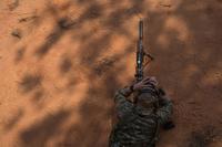 A U.S. Air Force Special Tactics operator observes a target.