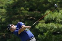 Korea's Si Woo Kim practices at the 2020 Summer Olympics