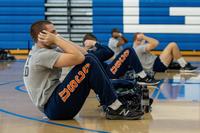 Recruits  do sit-ups in the gym at U.S. Coast Guard Training Center