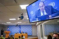 Russian Foreign Minister Sergey Lavrov seen on a video screen.