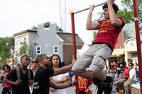 A high school senior takes a Marine Corps pull-up challenge.