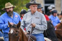 Former Vice President Mike Pence rides on horseback with members of BraveHearts