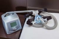 CPAP machine on bedside table