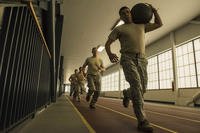 Airmen run laps during the Arctic Defender Challenge.