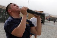 A soldier finishes an exhaustive workout.