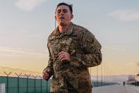 An Army paratrooper runs during a candidate assessment course.