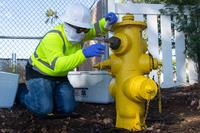 NAVFAC contractor collects water sample at Joint Base Pearl Harbor-Hickam