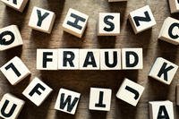 Fraud spelled out in Block Letters