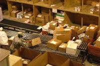 U.S. Army soldier sorts through mail at Bagram.