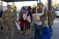 Family and friends gather to welcome home soldiers.