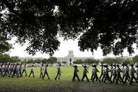 Citadel cadets practice for their weekly parade on the grounds of Summerall Field on the campus of The Citadel in Charleston