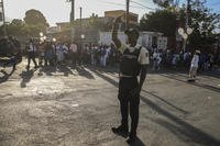 national police controls security on a street in Port-au-Prince, Haiti