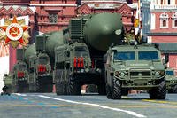 Russian RS-24 Yars ballistic missiles roll in Red Square.