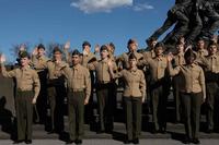 U.S. Marines reenlist at the Marine Corps War Memorial.
