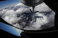 U.S. Air Force F-16 refuels in mid-flight from a KC-135 Stratotanker during a Red Flag exercise 
