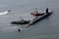 nuclear-powered submarine USS Michigan approaches a naval base in Busan, South Korea