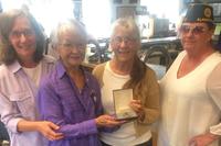 Klamath Falls American Legion Post 8 members return lost Purple Heart medal to veteran's family. 