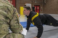 Spc. Lucas Johnson, a Georgia National Guardsman, pushes to max the push-up event on the Army Physical Fitness Test during the Region III Best Warrior Competition at Camp Butner, N.C.