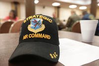 A Coast Guard veteran encourages several of his military peers to take advantage of the many VA programs during the monthly veterans breakfast at Marine Corps Logistics Base Albany, Ga.