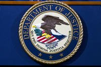 The Department of Justice seal is seen in Washington