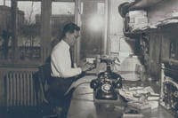 Journalist  K.C. Hwang working in his office