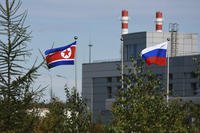 North Korean and Russian flags are seen at the Vostochny cosmodrome outside the city of Tsiolkovsky