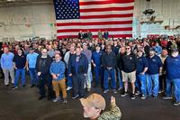 USS George Washington plank owners gather in the ship’s hangar bay