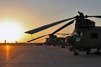 U.S. Army soldiers conduct preflight checks on CH-47 Chinooks