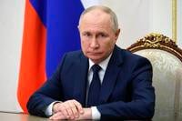 Russian President Vladimir Putin makes a video address