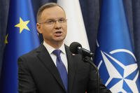 Poland's President Andrzej Duda gives a statement to the media