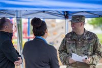 Members of the Idaho National Guard visit a job fair hosted by the Idaho Air National Guard Airmen and Family Readiness Program.