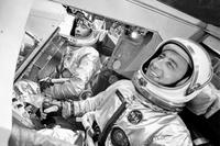 The astronauts selected for the first crewed flight of NASA's Project Gemini undergo a flight test profile in a mockup Gemini spacecraft. Visible in the photo are Astronauts Virgil I. “Gus” Grissom (left) and John W. Young.