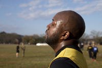 Staff Sgt. Bruce Corbett breathes a sigh of relief after finishing the 2-mile run during a diagnostic Army Combat Fitness Test.