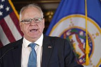 Minnesota Gov. Tim Walz speaks to the media