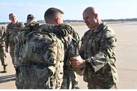 Then Maj. Gen. Jonathan Stubbs greets returning Arkansas Guardsmen