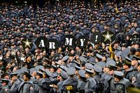 West Point cadets in gray dress uniforms fill the stands.