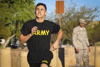 Army Reserve Spc. Julian Ditona, a multi-channel transmission systems operator/maintainer, assigned to the 98th Expeditionary Signal Battalion, 335th Signal Command (Theater), sprints to the finish line of a 2-mile run during the Army Physical Fitness Test at Fort Huachuca, Arizona.