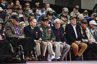 World War II veterans Paul Wirth, Charles Juror, Stanley Friday, Harold Terence and Vincent Hynes sit together after being awarded the French National Order of Merit at the 75th D-Day Anniversary ceremony at Normandy American Cemetery and Memorial in Colleville-sur-Mer, France.