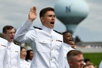 Midshipman Richard Poist takes his oath of office to become a Navy ensign