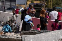 People cross into Syria on foot from Lebanon