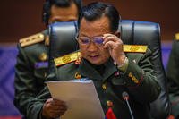 Laos' Defence Minister Chansamone Chanyalath addresses the ASEAN Defence Ministers' informal Meeting