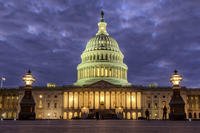 Lights shine inside the U.S. Capitol Building