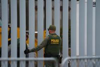 Border Patrol agents work at the U.S. Mexico border at Border Field State Park in San Diego County.