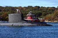 The USS Oregon (SSN 793) transits the Thames River after returning from routine operations in route to Naval Submarine Base New London in Groton, Conn.