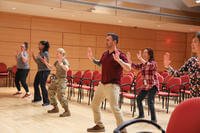 Members of the Walter Reed Army Institute of Research participated in a lunchtime Zumba class in Silver Spring, Maryland.