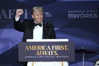 President-elect Donald Trump gestures after speaking during an America First Policy Institute gala.