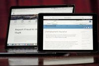 Web pages used to show information for collecting unemployment insurance in Virginia, right, and reporting fraud and identity theft in Pennsylvania, are displayed on the respective state web pages, on Feb. 26, 2021, in Zelienople, Pa.