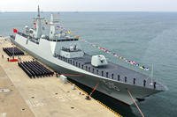 In this photo released by Xinhua News Agency, an aerial drone photo shows China's first Type 054B frigate