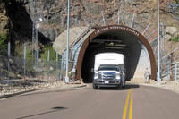 In this Thursday, May 10, 2018 photo, a crew bus leaves the Cheyenne Mountain Air Force Station complex