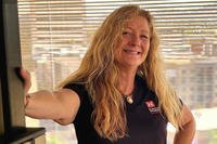 Therese Carpenter, a regulatory project manager with the U.S. Army Corps of Engineers Los Angeles District, poses for a photo in the Phoenix area office.